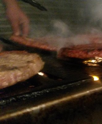 Burgers being cooked on our BBQ